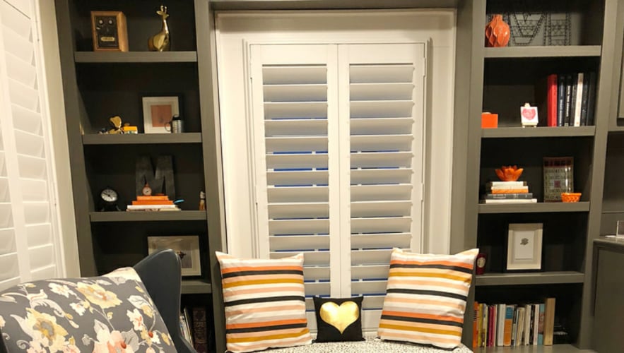 Plantation shutters in a den